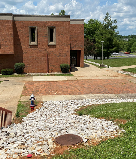 Rocks on ground outside of Student Center to protect erosion from water