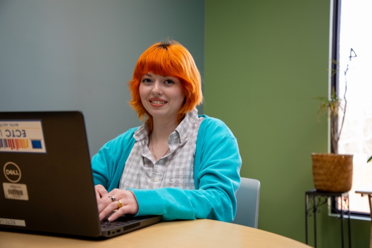 student working on a laptop