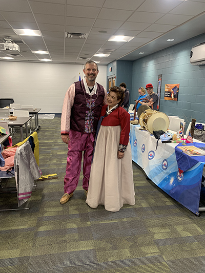 President Dr. Pate and Japan woman with Japan outfits