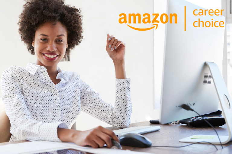 business woman at computer with amazon career choice logo