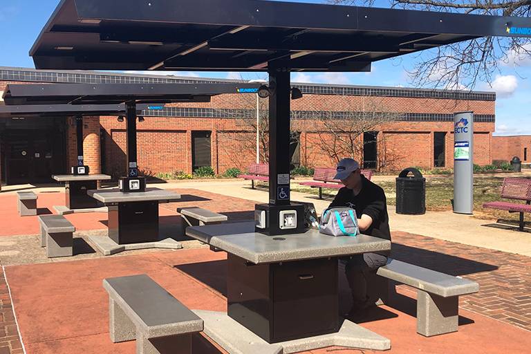 Solar Charging Tables outside on patios