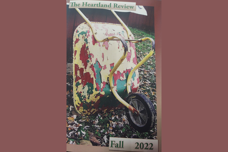 Wheel-barrow showing The Heartland Review - Fall 2022