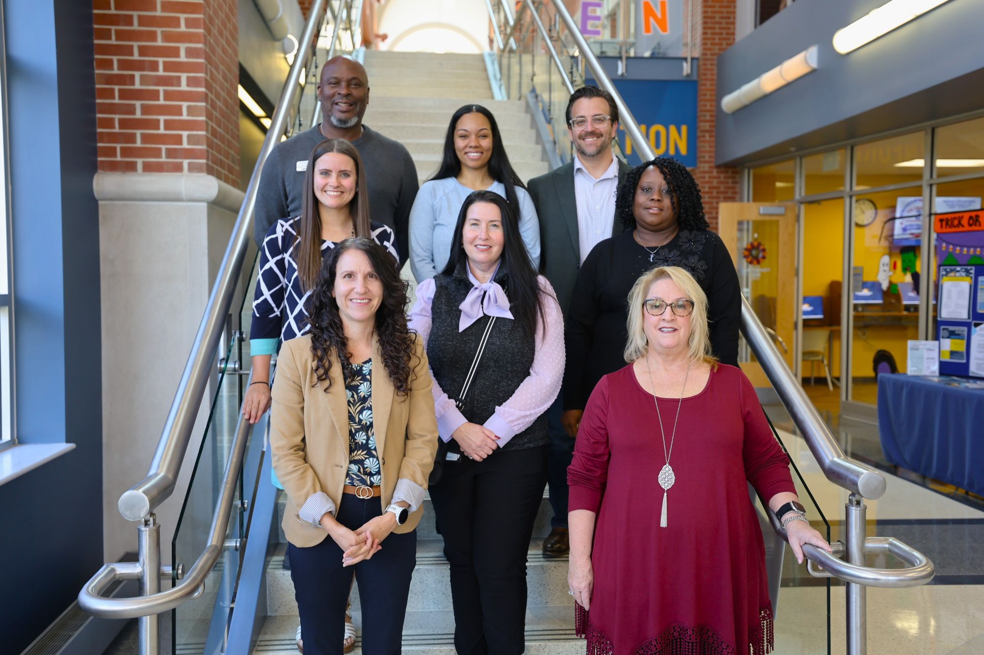 Abound Military and Veteran Services standing on a staircase