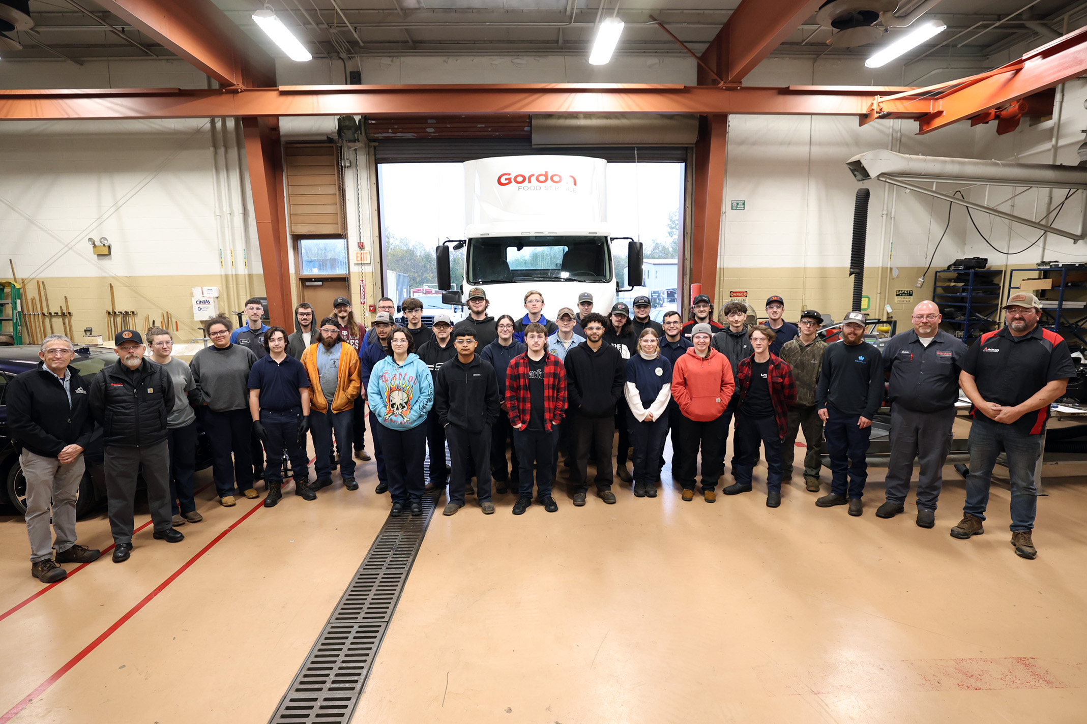 group in front of the Gordon Food Service Diesel Donation