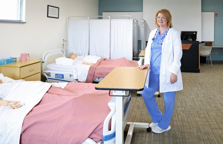 Tabitha Stevenson standing in nursing lab