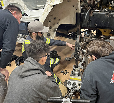 Students working on diesel technology
